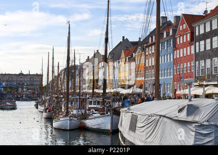 A picturesque view of Nyhavn pier with color buildings, ships, yachts and other boats in the Old Town of Copenhagen, Denmark. Scandinavia. Europe. Stock Photo