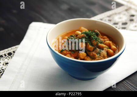 Simple vegetable soup. European cuisine. Chickpeas, potato and carrot. Organic food. Vegan dish. Vegetarian lunch. Stock Photo