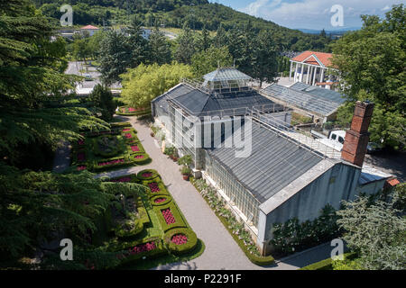 Botanical garden of Sežana, 19th century, Slovenia A 150-years old cedar, flowerbeds, blooming pergolas and the palmarium - garden of joy Stock Photo