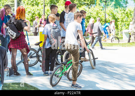 Group of teenagers with bicycles in the Park on the velodrome Stock Photo