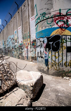 Bethlehem, Palestine, June 11, 2018: Palestinians cover separation wall with graffiti. Stock Photo