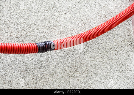 red plastic pipes for electric wires Stock Photo