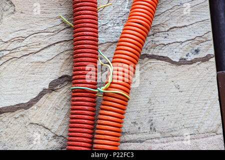 red plastic pipes for electric wires Stock Photo