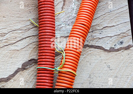 red plastic pipes for electric wires Stock Photo
