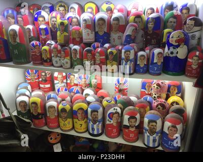 Russian dolls of football figures in a souvenir shop in the centre of Moscow which quoted a price of 7,000 Russian rubles (&Acirc;&pound;84) for the wooden likeness of the England captain Harry Kane (bottom shelf back row third left) as anticipation builds for the opening of the World Cup. Stock Photo