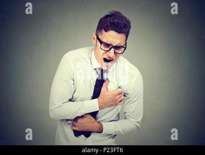 Man having chest pain, heart attack. Stock Photo