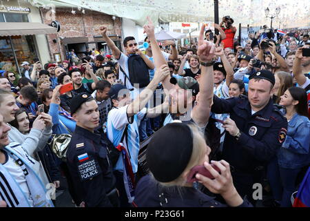 Supporters of the Argentine national football team in the street near Red Square on the eve of the 2018 FIFA World Cup in central Moscow, Russia. Stock Photo