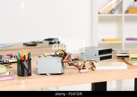 different equipment for engineering on tables in living room Stock Photo