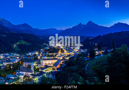 Local view of Berchtesgaden at night with Pfarrkirche St. Andreas and Stiftskirche St. Peter, behind it Watzmann massif, Berchtesgadener Land (district), Upper Bavaria, Bavaria, Germany, Europe Stock Photo