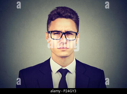 Serious young business man in glasses Stock Photo