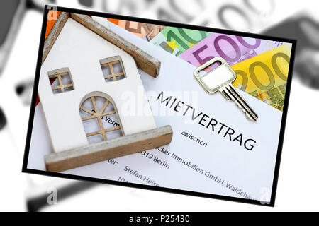 House, 'Mietvertrag' (rental agreement), key, banknotes Stock Photo