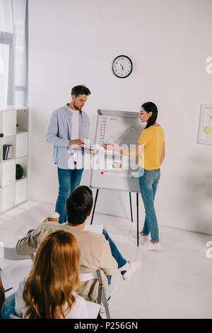 business people in casual clothing having business training in office Stock Photo