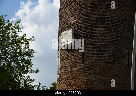 Old city gate of Delft, this view shows the sundial. The guards would use this to determine when to close the gate. Stock Photo