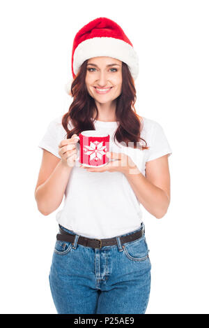 smiling woman in Santa hat with cup of coffee, isolated on white Stock Photo