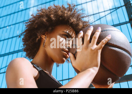 Teen girl adjusting bra Stock Photo - Alamy