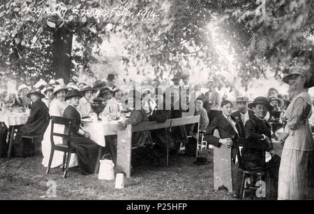 . English: Hagnaby Grange Fete in 1914, at Hagnaby, a hamlet in East Kirkby, Lincolnshire, England. Hagnaby Grange is situated just east of St Andrew's Church, and next to Hagnaby Beck (stream), on the Sleaford Road (today's A155). The photgraph, which has been cropped to remove damaged edges, was produced by Thomas Bundock of Spilsby. 1914. Thomas Bundock 143 Hagnaby Grange Fete 1914, in Hagnaby, East Kirkby, Lincolnshire 02 Stock Photo