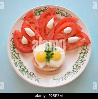 tomato and quail eggs Stock Photo