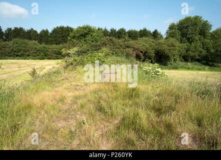 Air vents above a disused air raid shelter near Stanton Ironworks, Derbyshire, UK Stock Photo