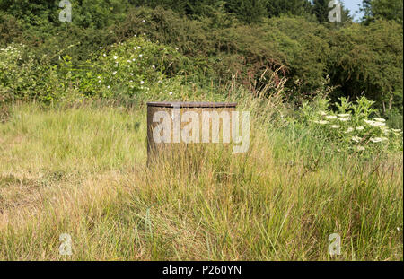 Air vents above a disused air raid shelter near Stanton Ironworks, Derbyshire, UK Stock Photo