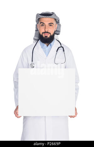 handsome muslim doctor holding blank board isolated on white Stock Photo