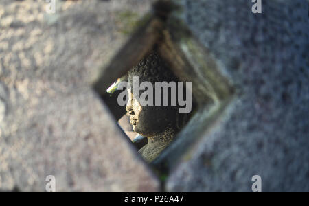 Buddha Statue inside of Pagoda, Borobudur Indonesia Stock Photo