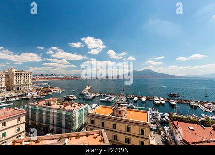 Italy, Campania, Province of Naples, Naples. View on Naples and Mount Vesuvius from the panoramic terrace of Castel dell'Ovo. Stock Photo