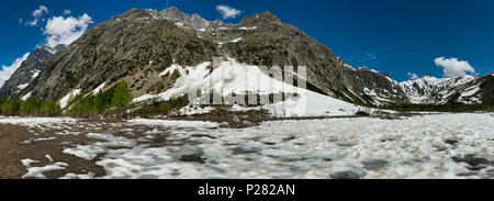 Aosta valley landscape in spring season during the melting snow in Val Ferret, beautiful day with blue sky Stock Photo