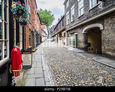 Elm Hill Norwich - a historic cobbled lane in central Norwich, UK. The street contains a number of historic buildings dating back to Tudor times. Stock Photo