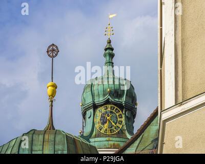 Detail of a steeple with dial of the parish church St. Peter and Paul in Lindenberg in the Allgaeu, Bavaria, Germany. Stock Photo