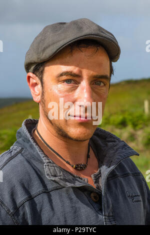 Israeli man wearing flat cap and casual clothes Stock Photo