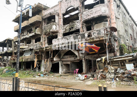 Marawi City, Philippines. 7th Feb. 2018. Damages and devastation in downtown Marawi City (so called 'Ground Zero') after the liberation by the Philippine Armed Forces following the one-year siege by ISIS in 2017 Stock Photo