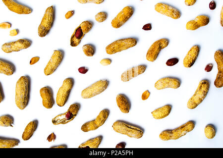 Baked peanuts in shells on the white background Stock Photo
