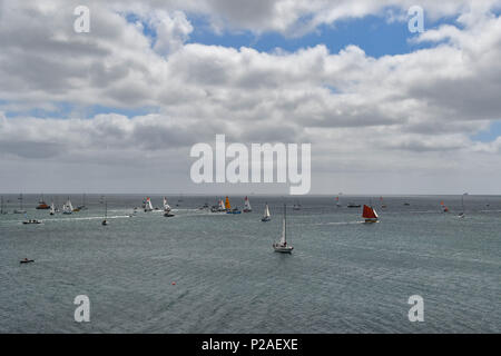 Falmouth, Cornwall, UK. 14th June 2018. Competitors line up for the start  of the SITraN Challenge Race to Les Sables d’Olonne, France, from where the Golden Globe race will start. The race was started by a Sir Robin Knox Johnstone from his boat Sulhaili, after a week of celibrations in Falmouth. Credit: Simon Maycock/Alamy Live News Stock Photo