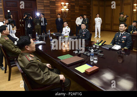 Seoul, South Korea. 14th June, 2018. June 14, 2018-Panmungak, North Korea-North Korean and South Korean Military delegates meet with talk during a Inter-Korean Military talk at Panmungak, North Korea. South and North Korea are holding their first high-level military talks in more than 10 years Thursday to discuss ways to ease cross-border tensions. The meeting started at 10 a.m. on the northern side of the truce village of Panmunjom, according to Seoul's defense ministry. These were the first such talks since the two sides met in December 2007. South Korea's five-member delegation is led by M Stock Photo