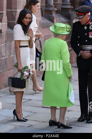 Meghan Markle, Duchess of Sussex, waves to the crowds after visiting  Chester with HM Queen Elizabeth II on their first public engagement  together. Chester, Cheshire, on June 14, 2018. Credit: Paul Marriott/Alamy