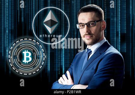 businessman with cryptocurrency holograms Stock Photo