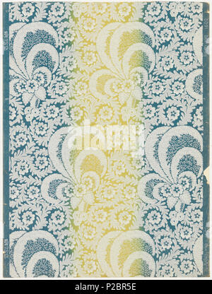 .  English: Sidewall, The Quincy, 1908 .  English: Full width with nearly two repeats of design. Large clusters of flowers and wind-blown foliage, with space-filling scrolls of foliage and single flower-forms on smaller scale. Irise or rainbow ground varies from blue to yellow and back to blue, in vertical stripes. Printed in white on ground of blue, green and yellow. . 1908 292 Sidewall, The Quincy, 1908 (CH 18353669) Stock Photo