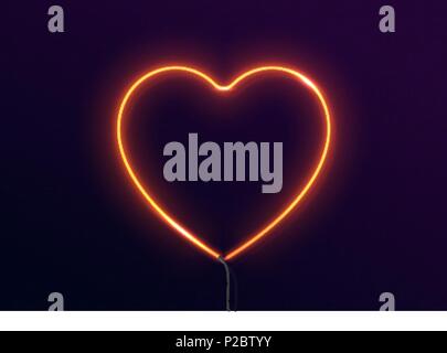 Happy Valentines Day on the background of neon light red heart Stock Vector