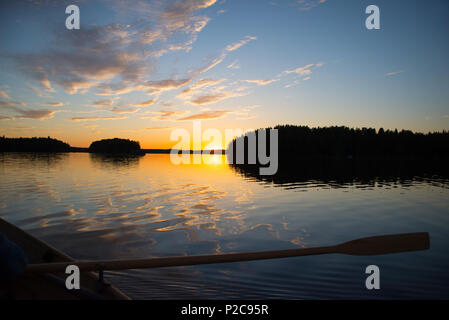 Sunset reflections. Lake Kukkia, Luopioinen, Finland. 24.6.2018 Stock Photo