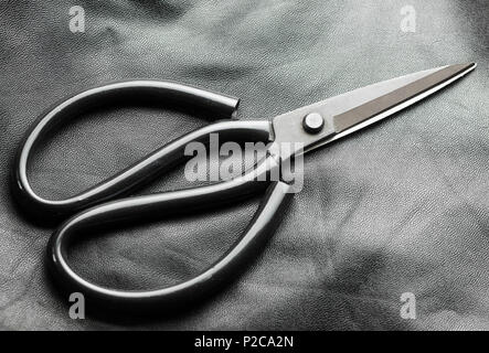 Metal Cutting Scissors on gray background. Close-up Stock Photo - Alamy
