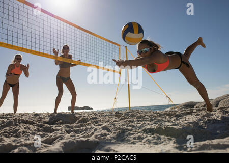 Female volleyball players playing volleyball Stock Photo