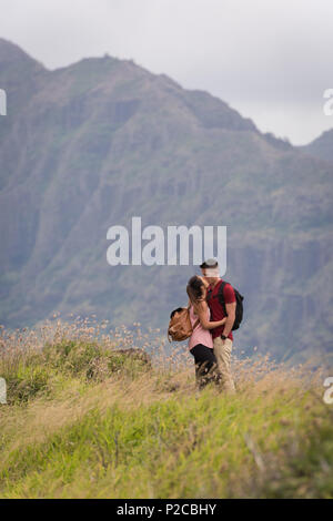 Couple kissing each other in countryside Stock Photo