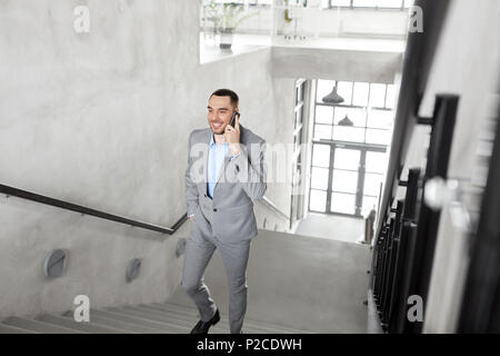 businessman calling on smartphone at office Stock Photo