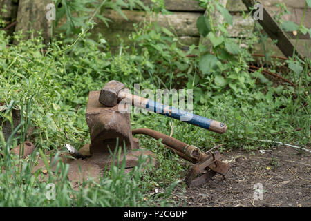 Hammer and anvil, tools of a blacksmith Stock Photo