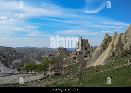 National Volcanic rocks with ancient cave houses in Goreme/ Cappadocia -Turkey. Cappadocia is an important center for domestic and foreign tourists. Stock Photo