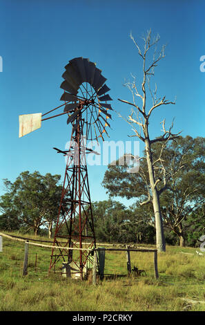 A disused and rusting old windpump on the Golden Highway between Merriwa and Cassilis, New South Wales, Australia Stock Photo