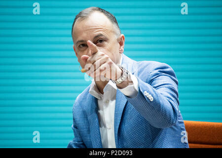 Hannover, Germany. 12th June, 2018. Dr. Martin Hofmann, Chief Information Officer (CIO) Volkswagen Group, speaks about future mobility at CEBIT 2018, international computer expo and Europe's Business Festival for Innovation and Digitization. Credit: Christian Lademann / LademannMedia Stock Photo