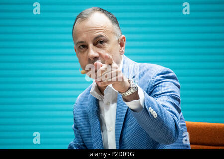 Hannover, Germany. 12th June, 2018. Dr. Martin Hofmann, Chief Information Officer (CIO) Volkswagen Group, speaks about future mobility at CEBIT 2018, international computer expo and Europe's Business Festival for Innovation and Digitization. Credit: Christian Lademann / LademannMedia Stock Photo