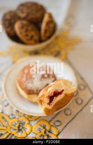 donuts and oatmeal cookies on the table Stock Photo