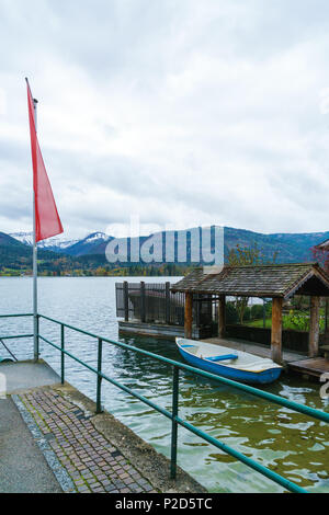 Quay on Lake Wolfgang or Wolfgangsee near St. Wolfgang town and Schafberg Alps mountain, Salzkammergut resort, Austria Stock Photo